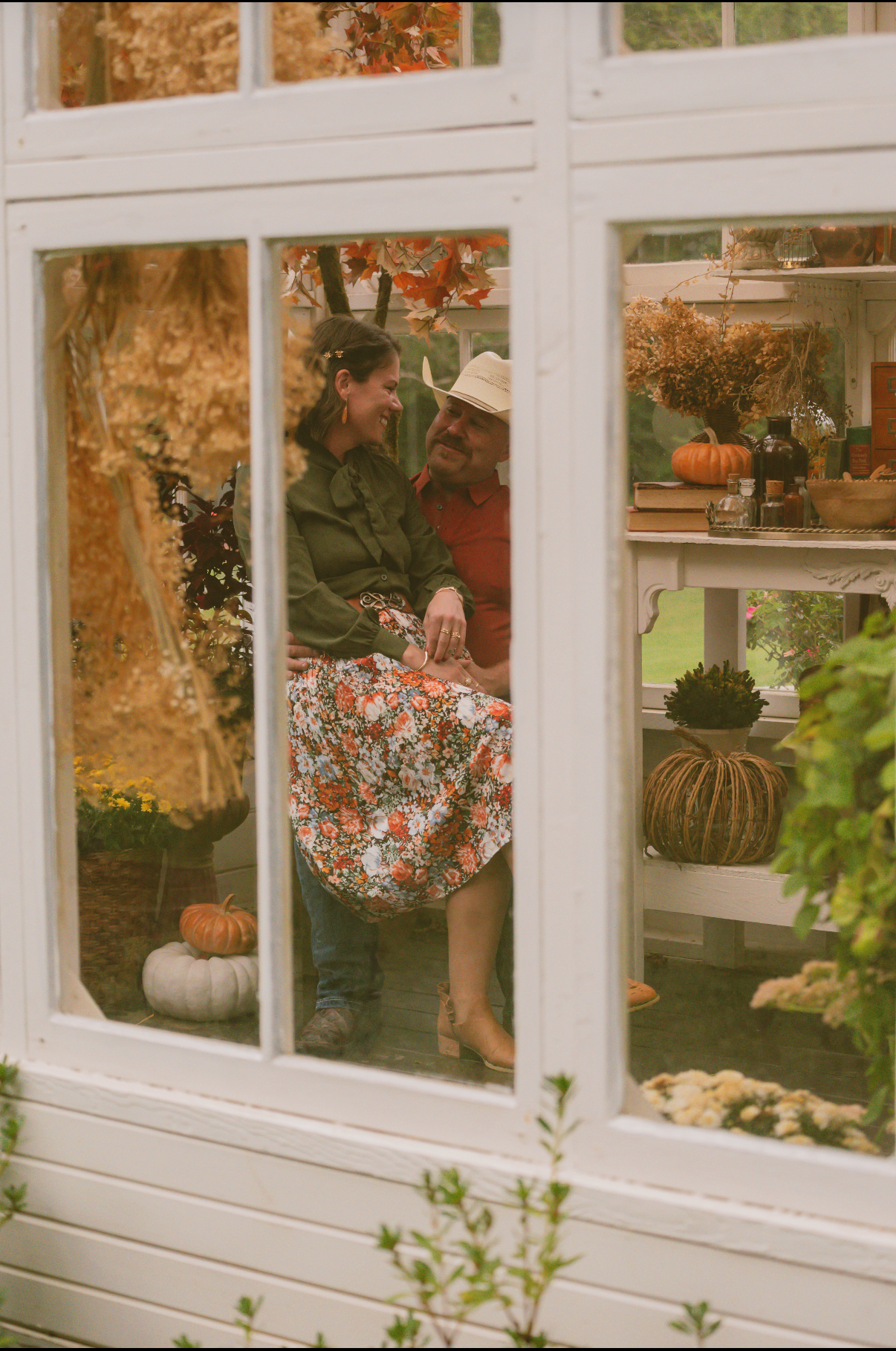 Front porch decorated for fall